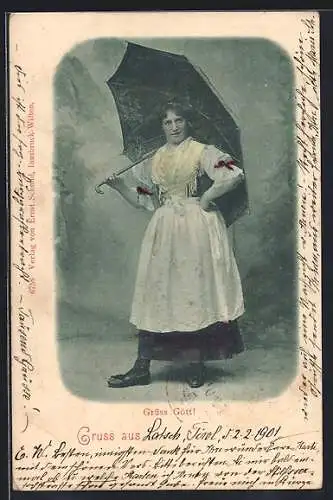 AK Frau in Tracht mit einem Schirm