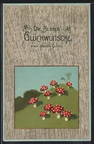 Präge-AK Fliegenpilze auf einem Hügel, Neujahrsgruss