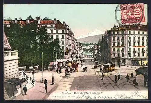 AK Geneve, Rue du Mont Blanc mit Strassenbahn und Hotel Suisse