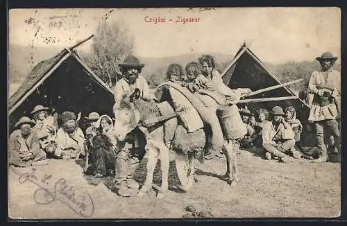 AK Czigáni, Sinti und Roma / Zigeunerfamilie mit einem Esel