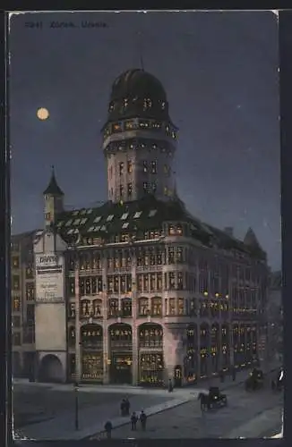 AK Zürich, Urania, Gebäudeansicht mit Strasse bei Nacht