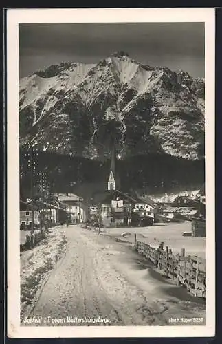 AK Seefeld i. T., Ortsansicht im Winter von der Strasse aus, mit Wettersteingebirge