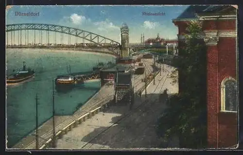 AK Düsseldorf, Rheinansicht mit Frachtschiffen und Eisenbahnbrücke