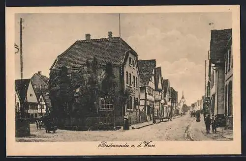 AK Bodenwerder, Strassenpartie mit Blick zur Kirche