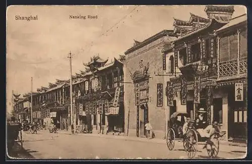 AK Shanghai, Nanking Road mit Geschäften, Rikscha