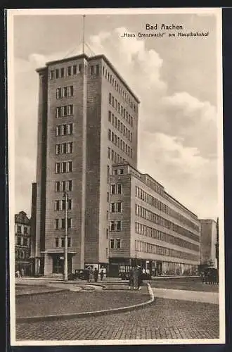 AK Bad Aachen, Haus Grenzwacht am Hauptbahnhof mit Auto und Passanten