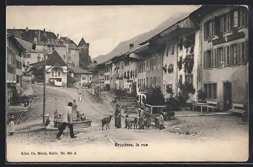 AK Gruyères, Einwohner auf einem Platz mit Brunnen