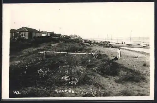 AK Thorpe, Beach with boats and houses