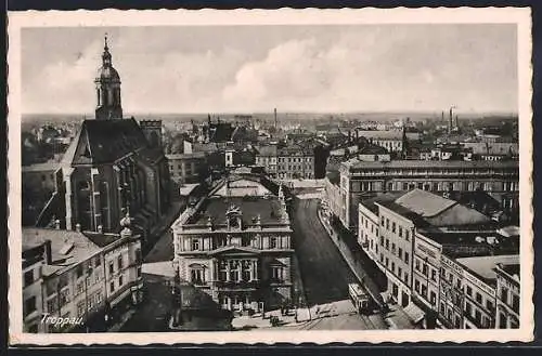 AK Troppau, Strassenpartie mit Kirche und Strassenbahn