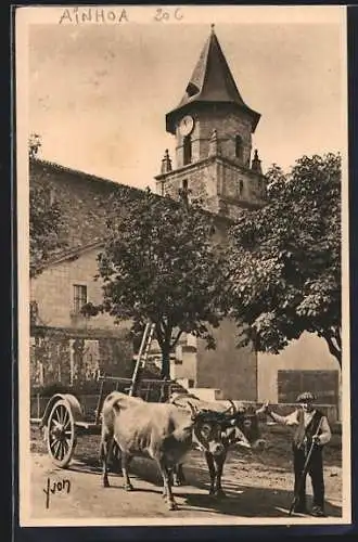 AK Ainhoa, un attelage basque, l`Eglise en arrière plan