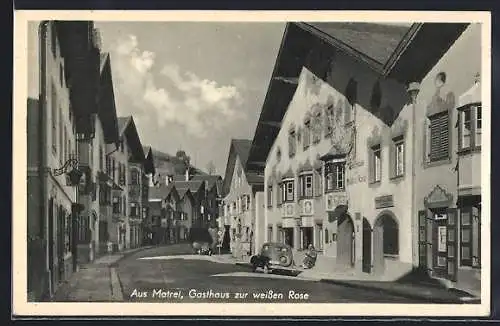 AK Matrei am Brenner, Strassenpartie mit Gasthaus zur weissen Rose