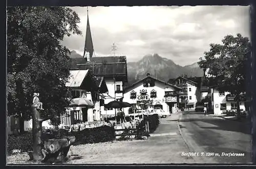 AK Seefeld i. T., Dorfstrasse mit Cafe
