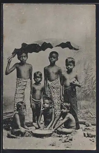 AK Group of Children under Banana Leaf