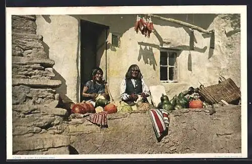AK Indianerpaar mit Kürbissen vor dem Haus