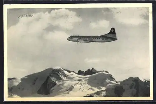 AK Flugzeug: Convair Liner der Swissair über schneebedeckten Bergen
