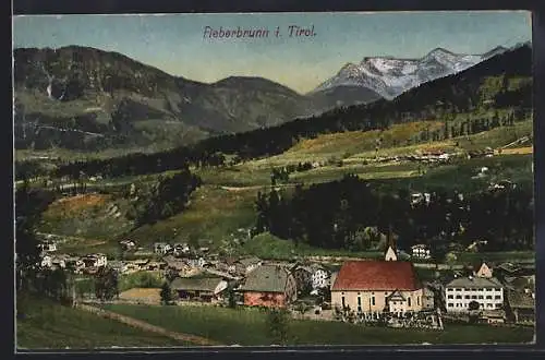 AK Fieberbrunn /Tirol, Gesamtansicht mit Bergpanorama