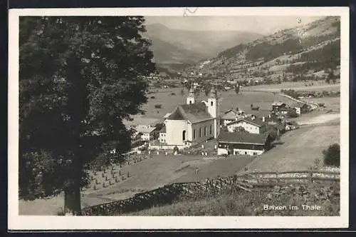 AK Brixen im Thale, Ortsansicht von einem Hang aus