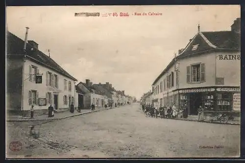 AK Piney, Rue du Calvaire avec commerces et passants
