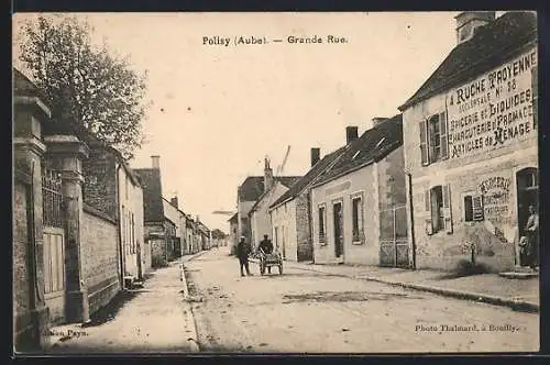 AK Polisy, Grande Rue animée avec commerces et passants