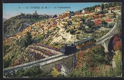 AK La Turbie, Le Funiculaire, Bergbahn zwischen bunten Blumen
