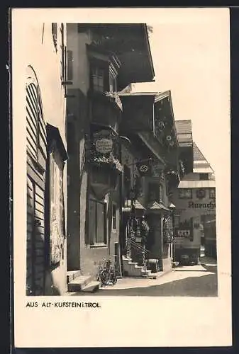 AK Kufstein, Strassenpartie mit Geschäften