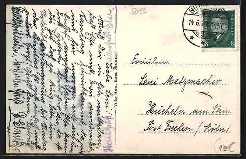 AK Niederembt, Strassenpartie mit Denkmal