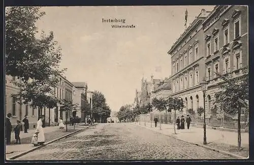 AK Insterburg, Wihelmstrasse mit Passanten