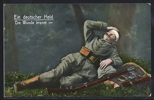 AK Verwundeter Soldat liegt auf dem Boden, Rotes Kreuz