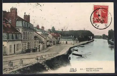 AK Nogent-sur-Seine, Rue des Écluses avec vue sur le canal et les maisons environnantes