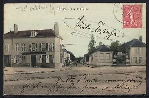 AK Piney, Rue de l`Église avec bâtiments et architecture locale