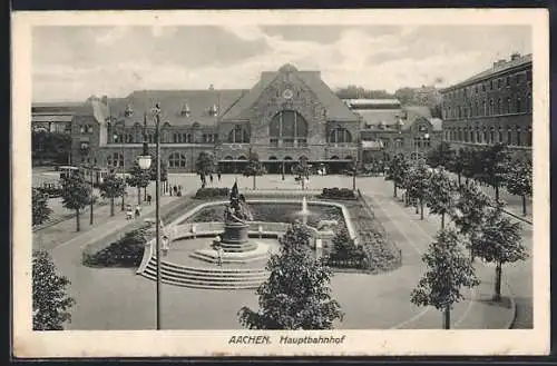 AK Aachen, Hauptbahnhof mit Denkmal und Strassenbahn