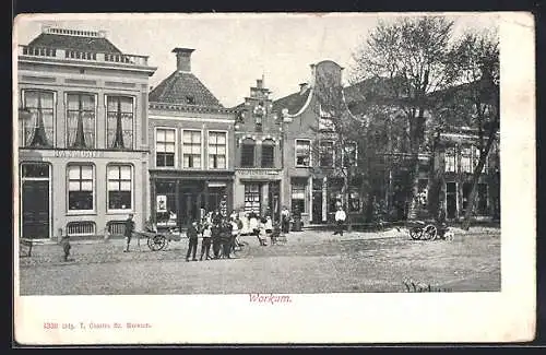 AK Workum, Strassenpartie mit Geschäften