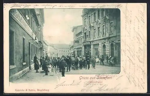 AK Stassfurt, Steinstrasse mit Café und Geschäft