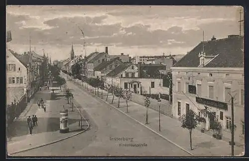 AK Insterburg, Bahnhofstrasse mit Geschäften