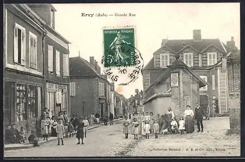 AK Ervy, Grande Rue animée avec habitants et bâtiments historiques