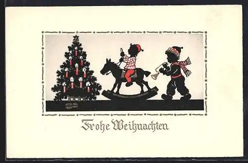 AK Kinder spielen vor einem Weihnachtsbaum
