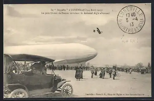AK Lunéville, Le petit Oiseau de France survolant le kolossal Zeppelin