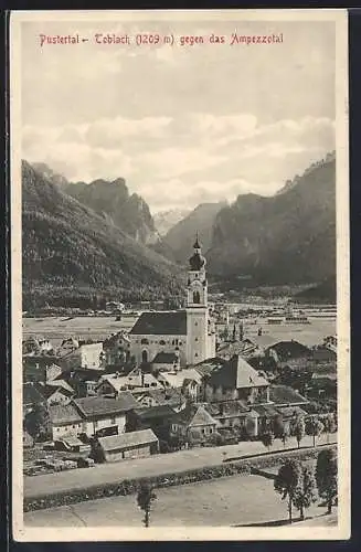 AK Toblach, Ortsansicht mit Kirche gegen das Ampezzotal