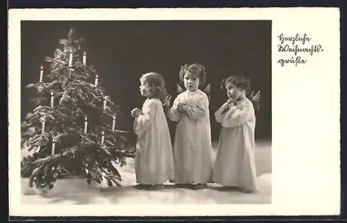 AK Weihnachtsengel neben einem leuchtenden Weihnachtsbaum