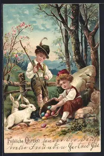 Präge-AK Kinder in Tracht mit Osterhasen und Eiern