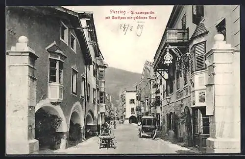 AK Sterzing, Strassenpartie mit Gasthaus zur goldenen Rose