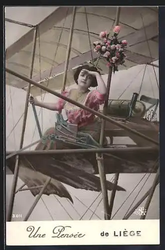 AK Liège, Dame mit Blumenstrauss in einem Flugzeug, Une Pensée