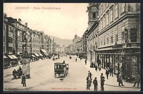 AK Innsbruck, Maria-Theresienstrasse mit Geschäften und Litfasssäule
