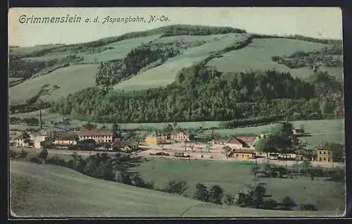 AK Grimmenstein a. d. Aspangbahn, Ortsansicht mit Bergen im Hintergrund