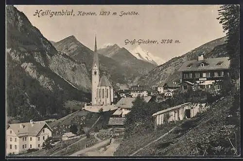 AK Heiligenblut /Kärnten, Strassenpartie mit Kirche und Gross-Glockner