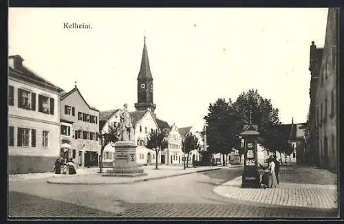 AK Kelheim, Strassenpartie mit Wettersäule und Kirche