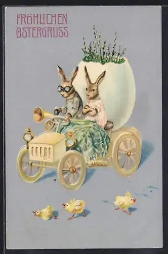 Präge-AK Osterhasen-Paar fährt in einem Eierschalen-Automobil