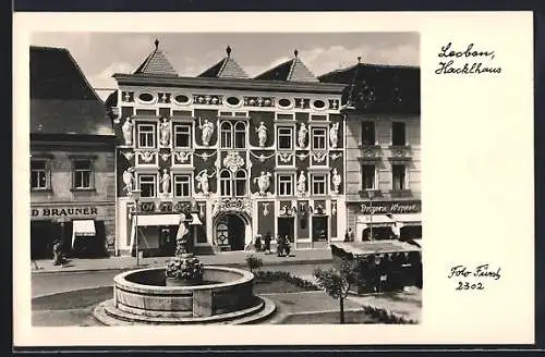 AK Leoben, Hacklhaus mit Geschäften und Brunnen