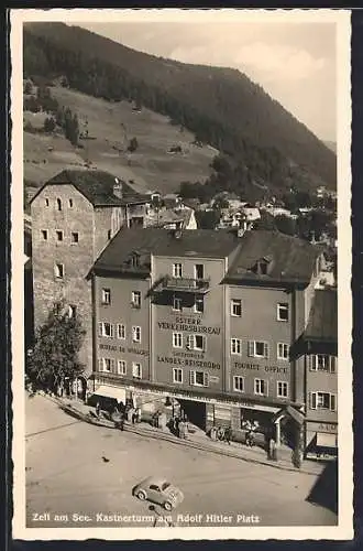 AK Zell am See, Österreichisches Verkehrsbureau-Salzburger Landes-Reisebüro und Kastnerturm am Platz