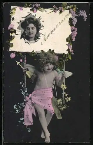 AK Amor sitzt auf einer Schaukel